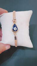 Load and play video in Gallery viewer, Rose Gold Evil Eye Bracelet

